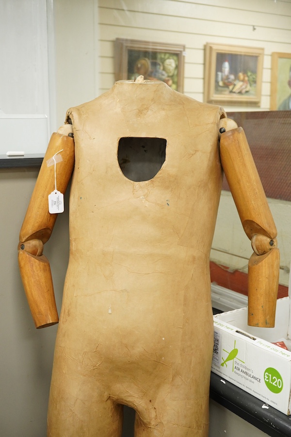 A 1930's wood and papier maché mannequin, height 160cm. Condition - fair